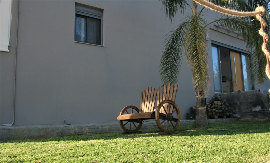 Villa Loftstyle - Außenbereiche, Terrassen, Die Palme-Lounge, Bank zum Ausruhen